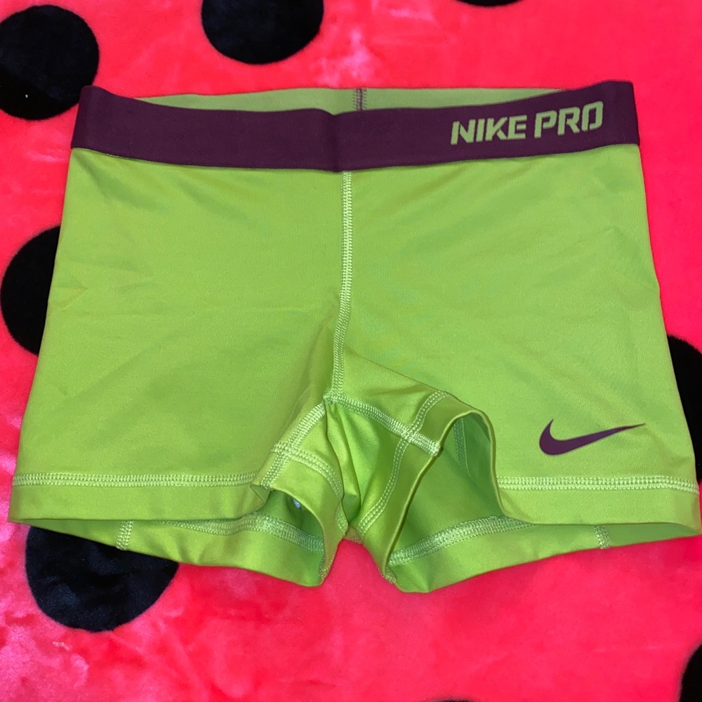 Neon green Nike spandex shorts